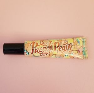 Perfectly Posh preach peach lip oil